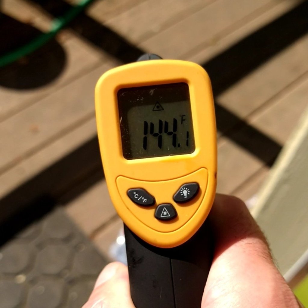 Picture of The temperature of the back deck on Monday from a digital laser thermometer. Seriously wtf.