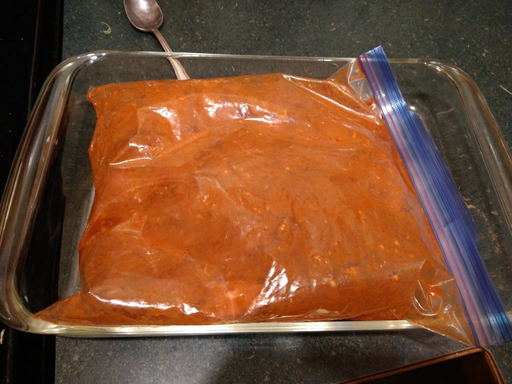 Jamaican Jerk pork marinating in a ziplock bag