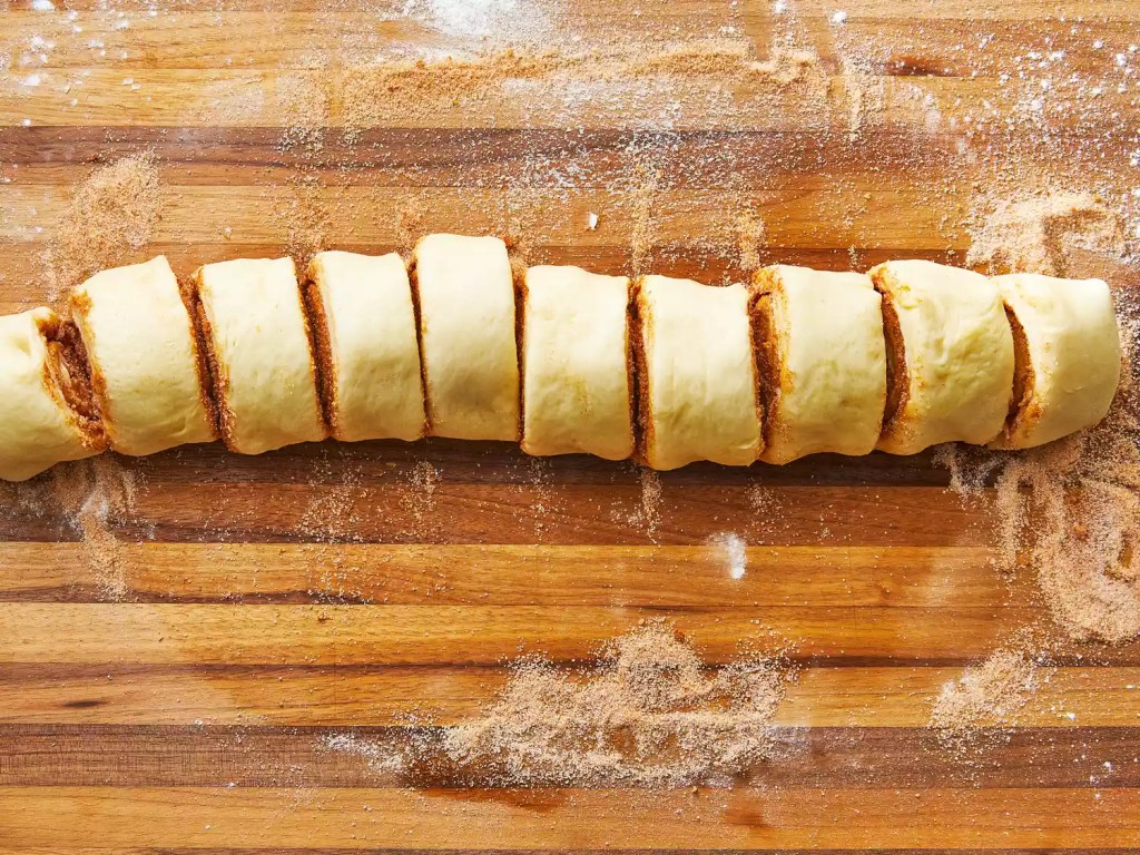 Slice the roll into 12 equal pieces

https://www.southernliving.com/thmb/eQnDHDw8LcUdsOybqnbOpMd1E6Y=/1500x0/filters:no_upscale():max_bytes(150000):strip_icc():format(webp)/Cinnamon_Rolls_024-8160f1dd17bf49638f9bc1c410daab5a.jpg