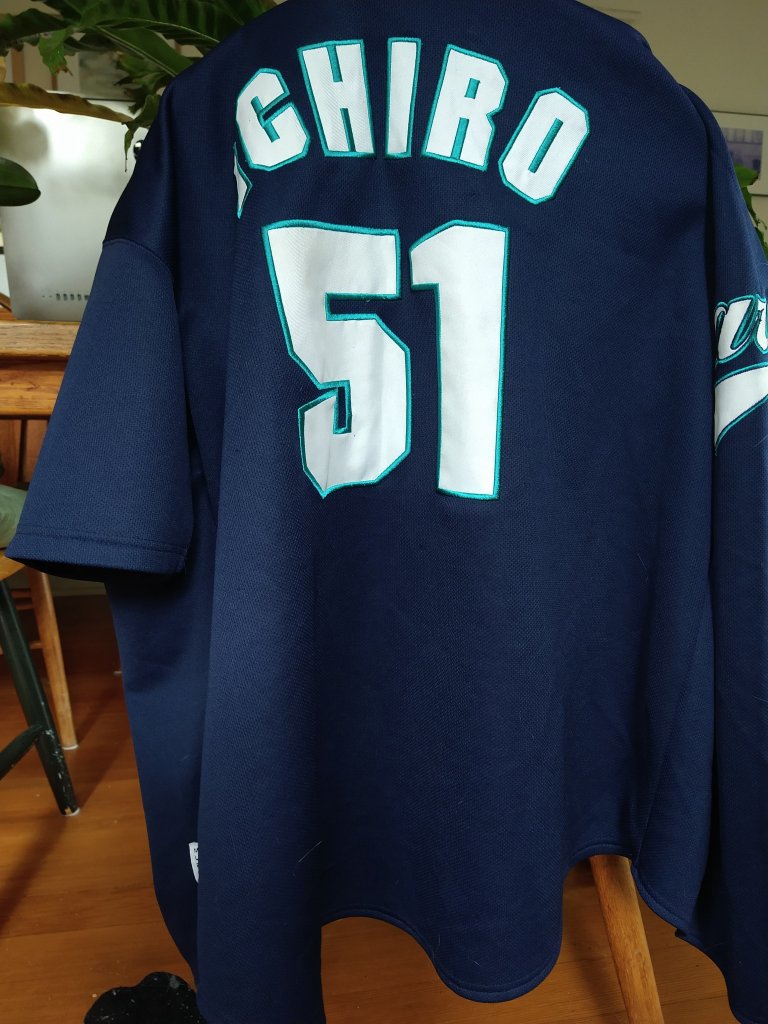This is a jersey of star player, and sure fire MLB hall of fame outfielder, #51 Ichiro Suzuki. It's 21 years old and was purchased by my dad. He would die 2 years later... Never to see the Mariners go to the postseason again. I've worn it a handful of times since when I would go to Mariners games. It's been hanging in my closet since 2013.
