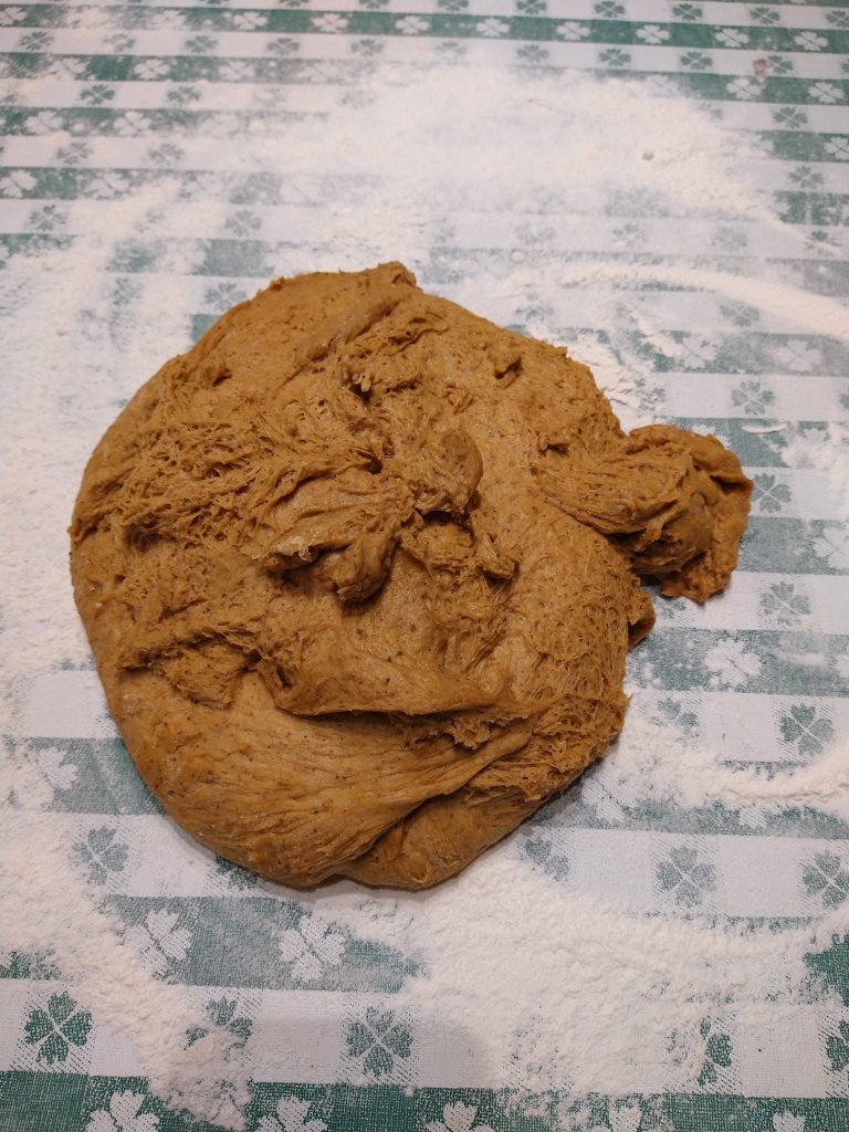 Picture of dough on floured table.