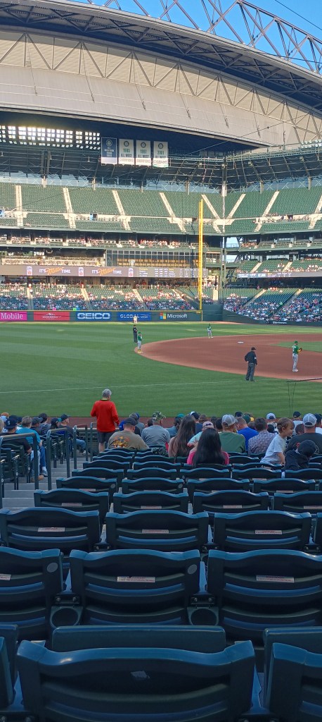 Picture of a night baseball  game at T mobile Field. Third base side.