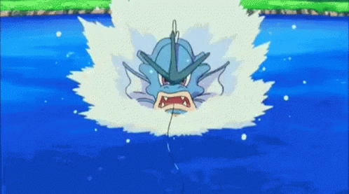 Pokemon Gyrados bursting up through blue water, and firing a fiery laser beam